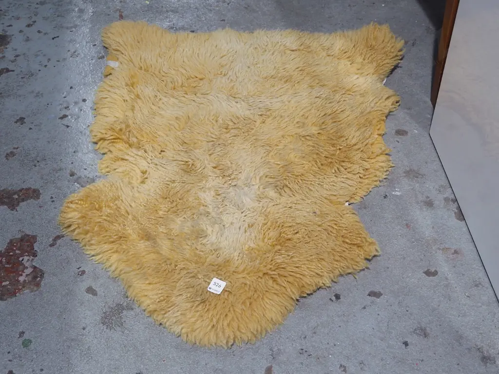 mustard coloured sheepskin floor mat Image 1++
