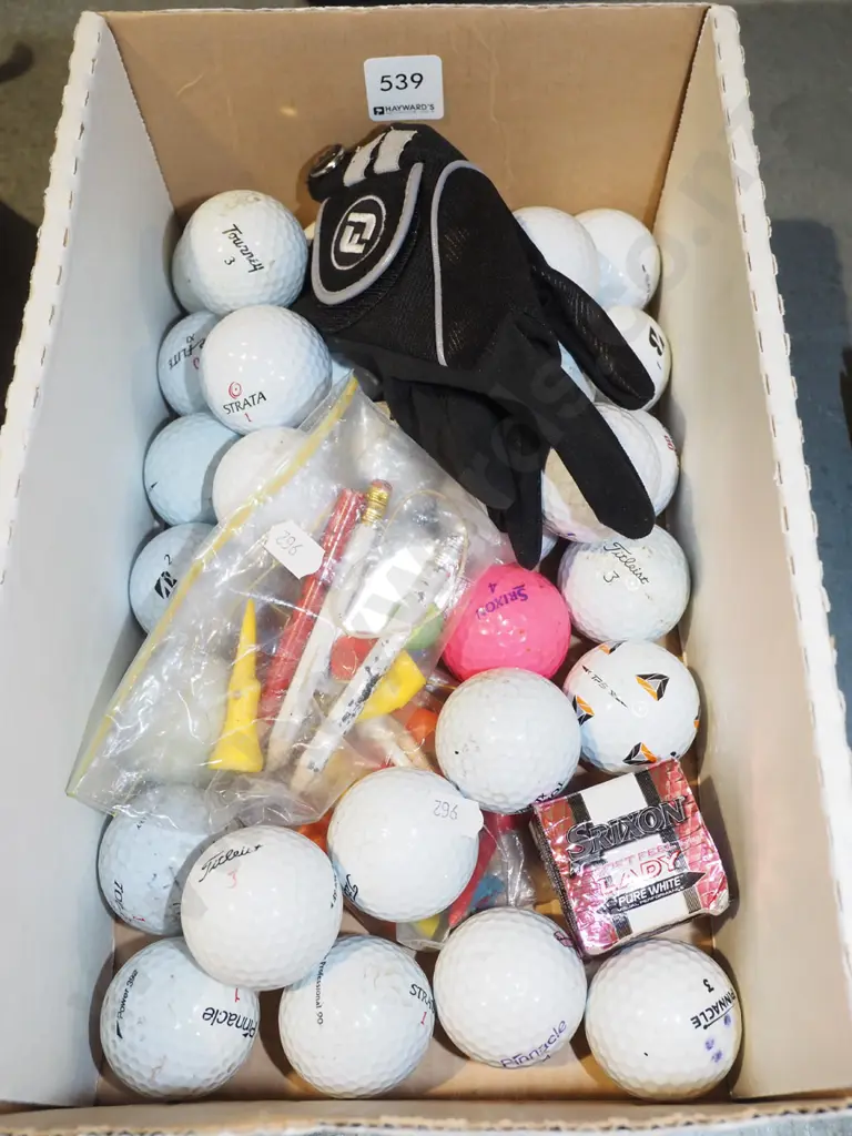 box; golf tees, balls, glove Image 1++