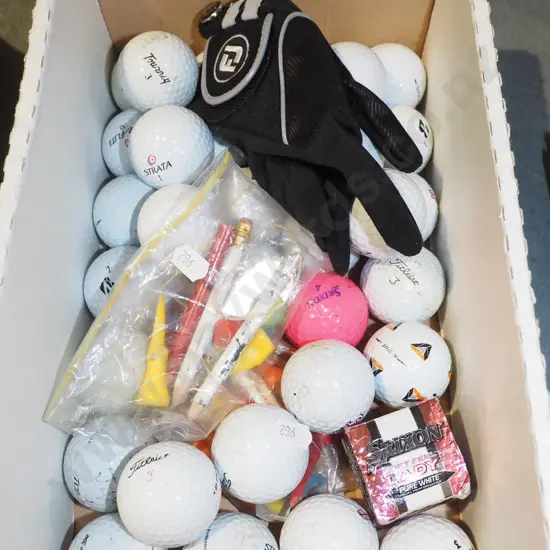 box; golf tees, balls, glove