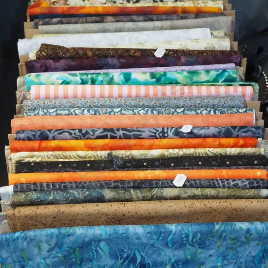 box of fabric pieces
