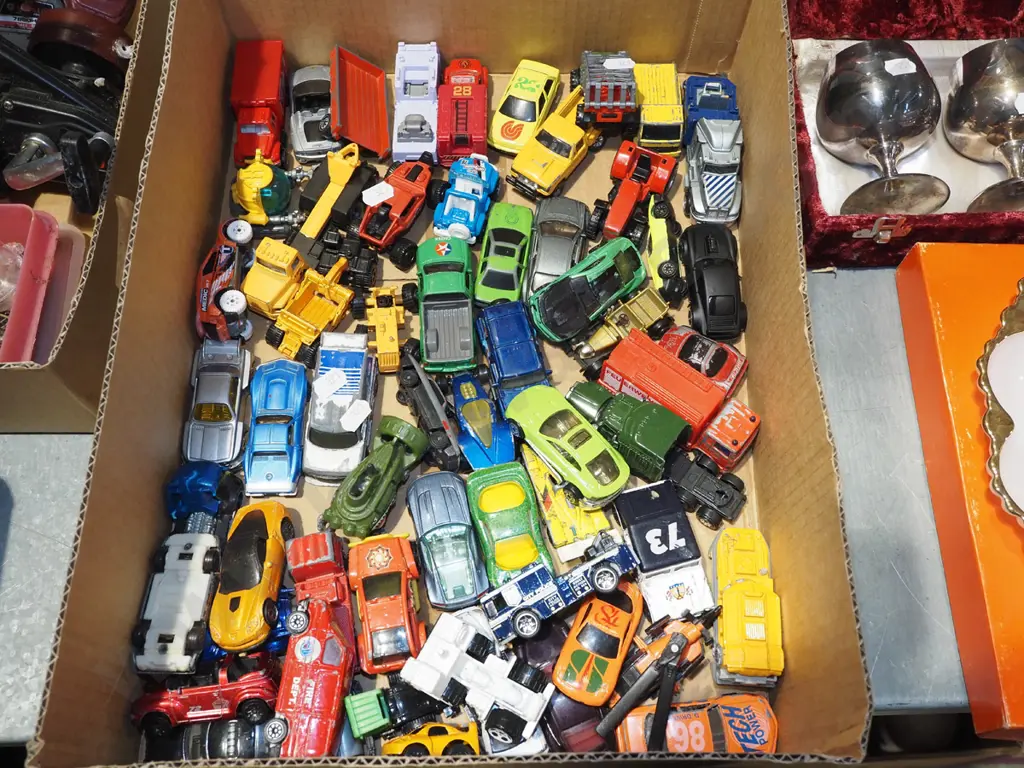 tray of toy vehicles Image 1++