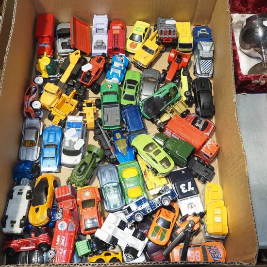 tray of toy vehicles