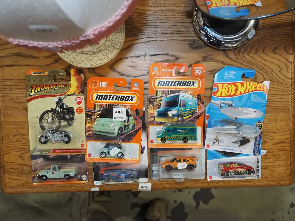 8x as new carded Hotwheels vehicles Image 1++