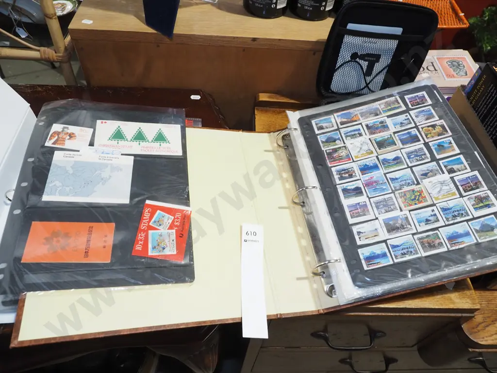 folder of stamps, phone cards Image 1++