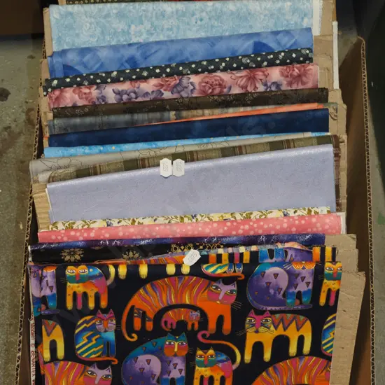 box of fabric pieces