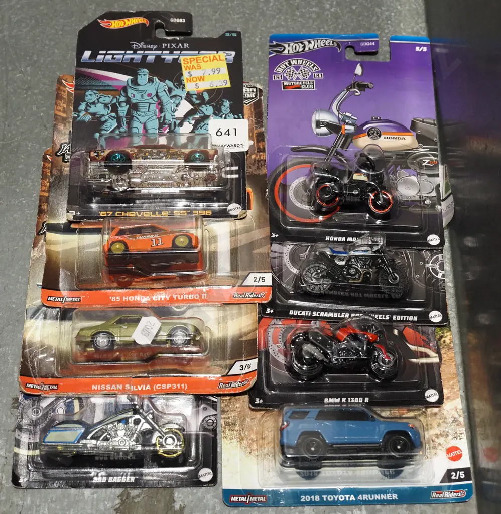 8x as new carded Hotwheels vehicles Image 1++