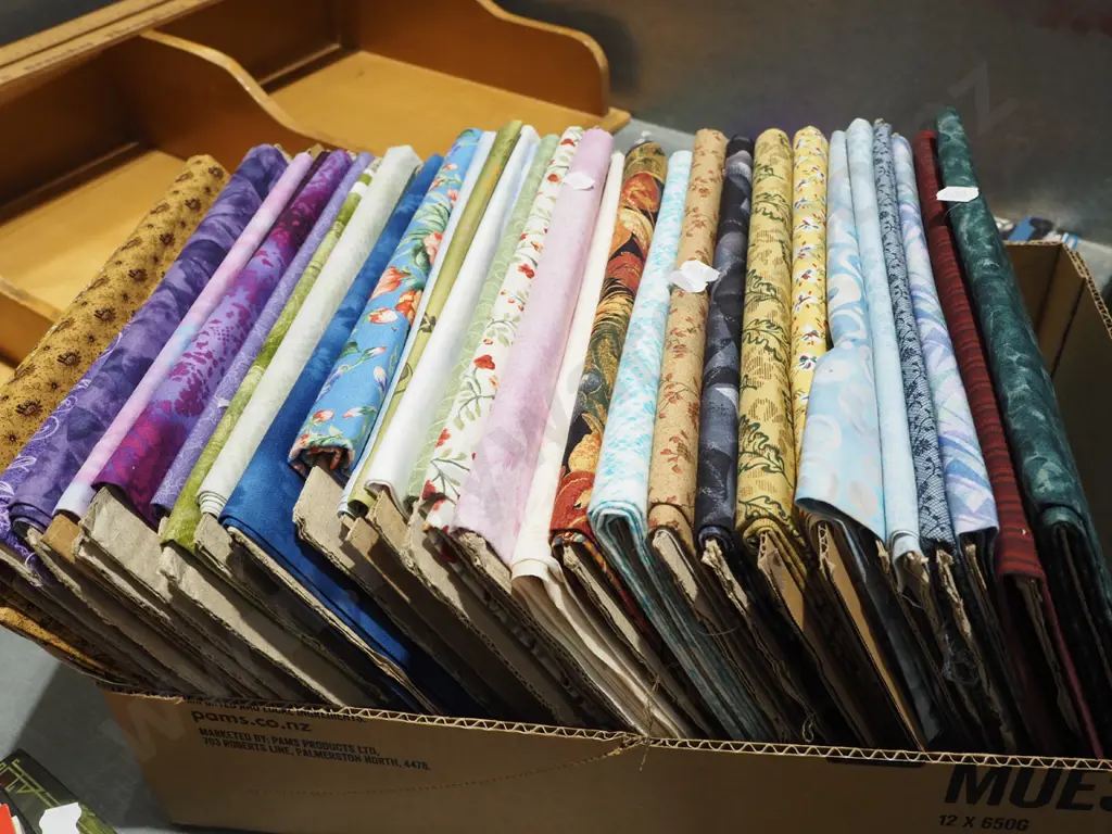 box of fabric pieces Image 1++
