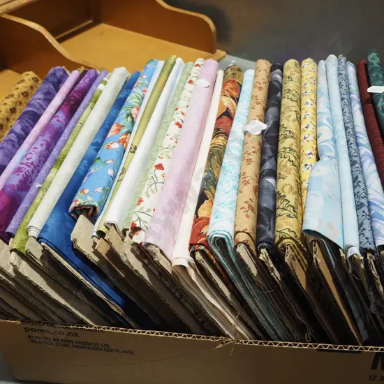 box of fabric pieces