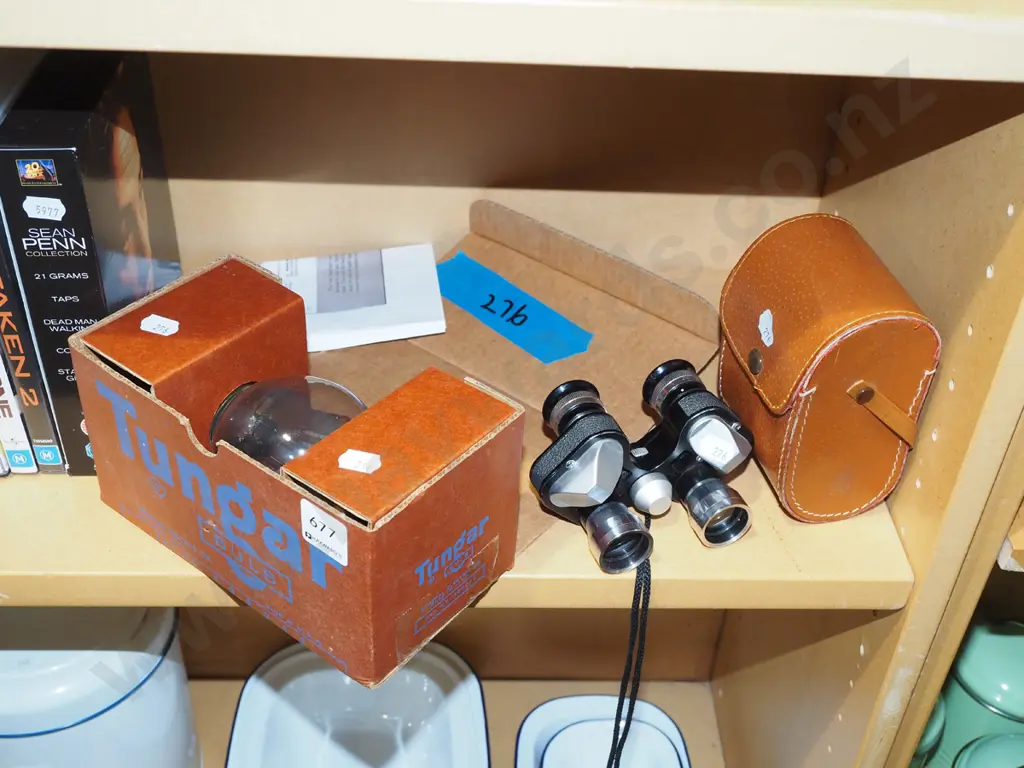 boxed GE Tungar lightbulb and a pair of compact 7x20 binoculars with leather case Image 1++
