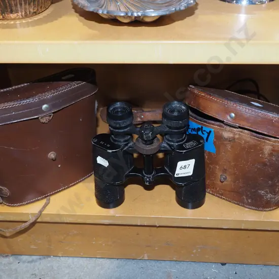 pair of restorer's 10x35 field binoculars - focus ring loose - and 2 leather cases