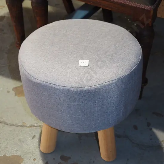 grey upholstered footstool