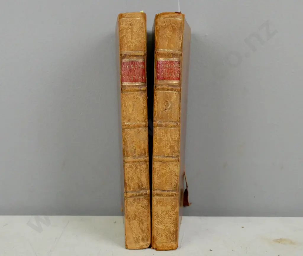 A Voyage Round The World Vol 1&2 by George Anson, Kilmarnock 1785. Some waterstaining and cover wear. Image 1++