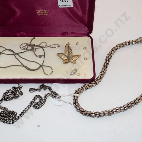 silver necklaces and brooches