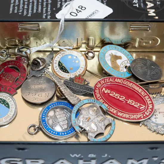 tin; badges, medallions