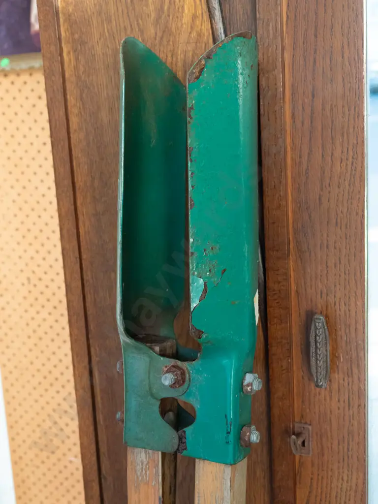 wood-handled post hole digger Image 1++