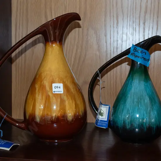 2x Blue Mountain ewer vases - smaller has repair to spout H320