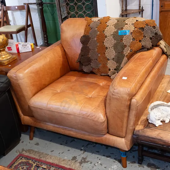 brown natural leather deep buttoned armchair and footstool