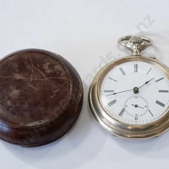 pocket watch in leather case, going