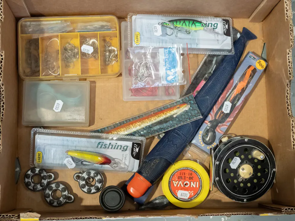 box; fishing lures, hooks, reel etc Image 1++