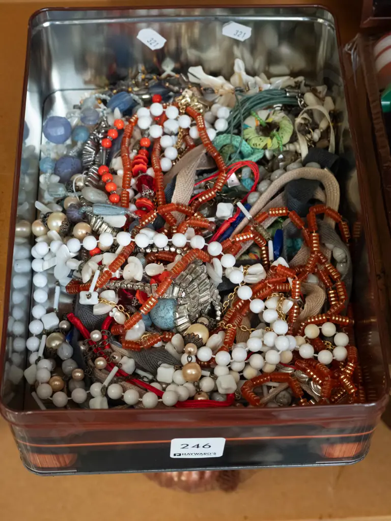tin of costume jewellery Image 1++