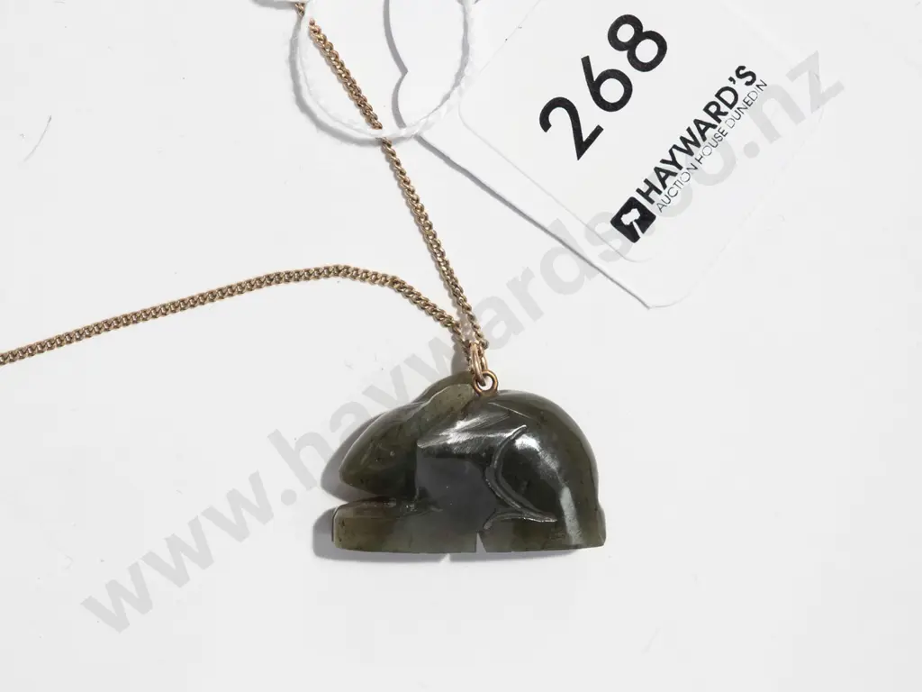 gold coloured chain with greenstone pendant Image 1++