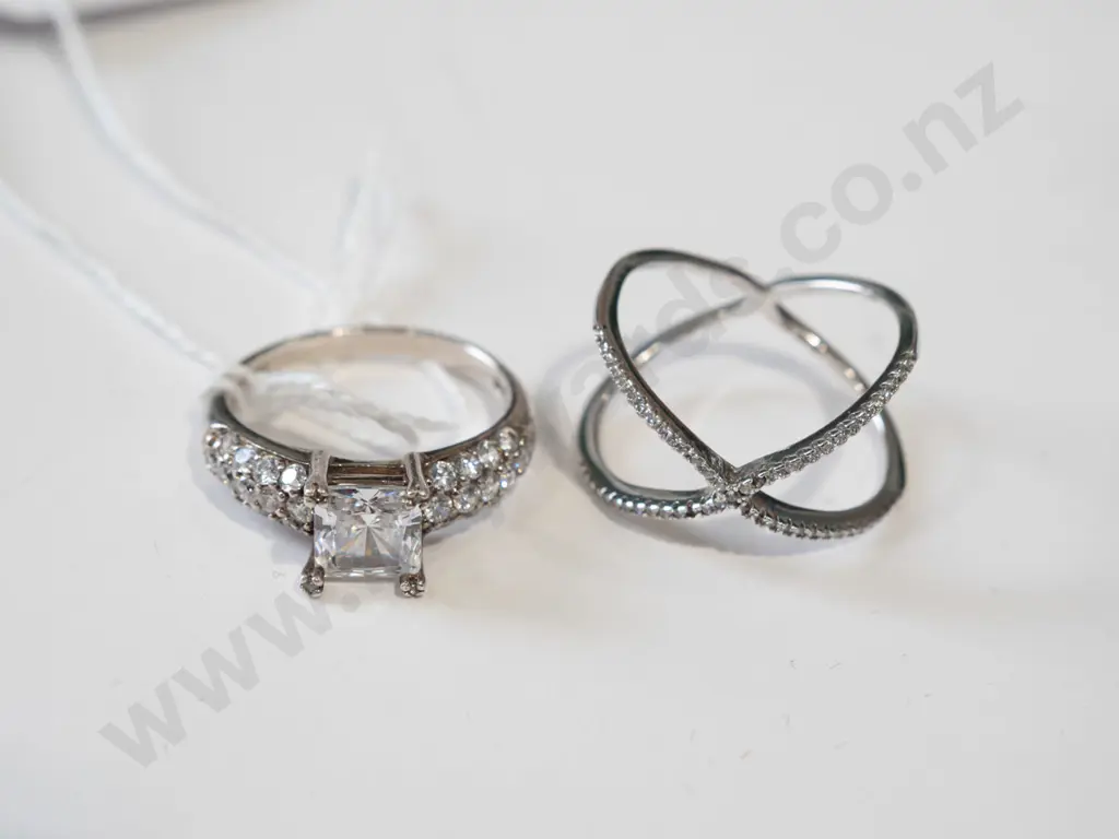 2x sterling silver rings - stones missing from crossover ring Image 1++
