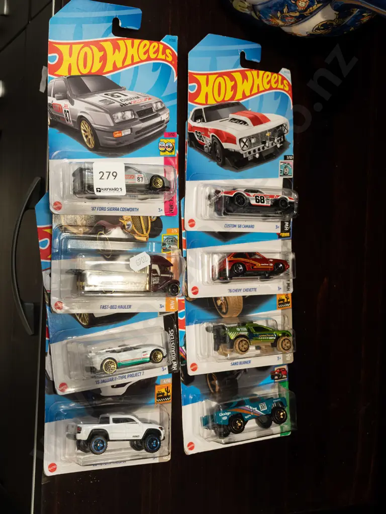 8x as new carded Hotwheels vehicles Image 1++