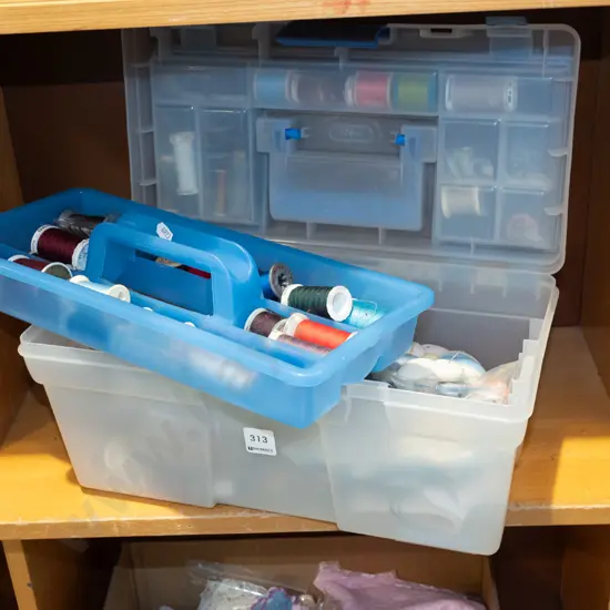 plastic organiser of sewing accessories, threads, elastic etc
