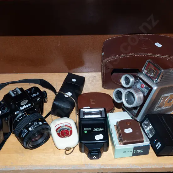 box; Nikon F-401 35mm camera, flashes and accessories, Brownie movie camera