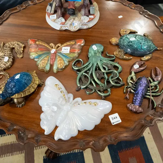 plastic wall mounted sea creatures etc