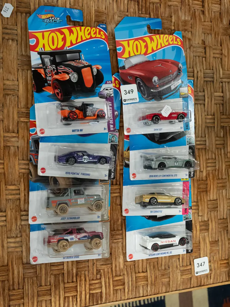 8x as new carded Hotwheels vehicles Image 1++