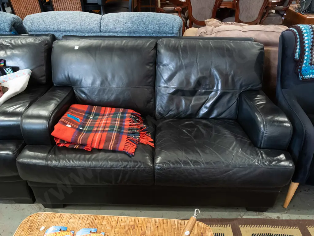 black leather upholstered 2 piece lounge suite - 2x 2 seater settees - some deterioration to leather in spots Image 1++