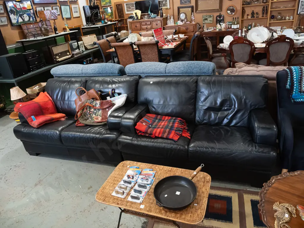 black leather upholstered 2 piece lounge suite - 2x 2 seater settees - some deterioration to leather in spots Image 1++