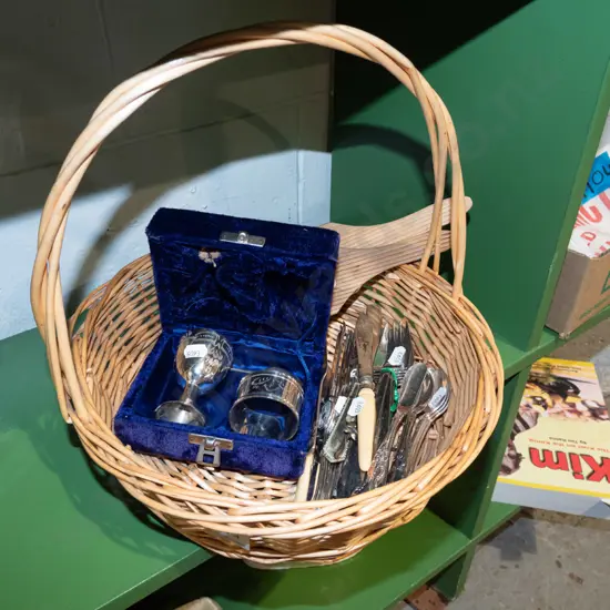 cane basket, cutlery, butter pats, plated presentation egg cup etc