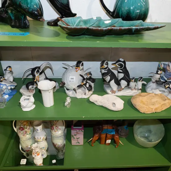 shelf; penguin figurines, vases, scent bottles etc