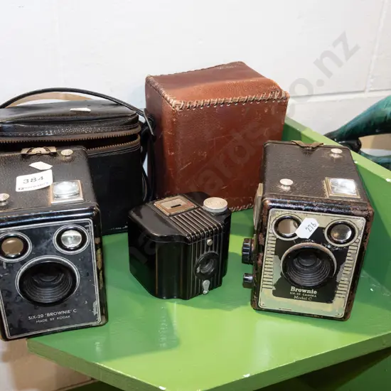 2x boxed brownie cameras, 1 other camera