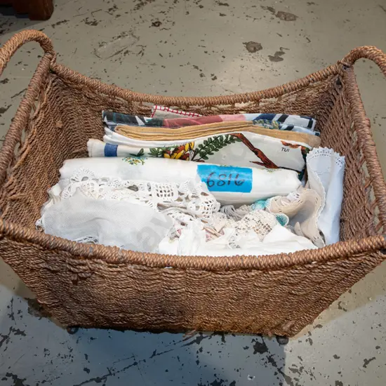 seagrass basket; doilies, tea towels, tablecloths