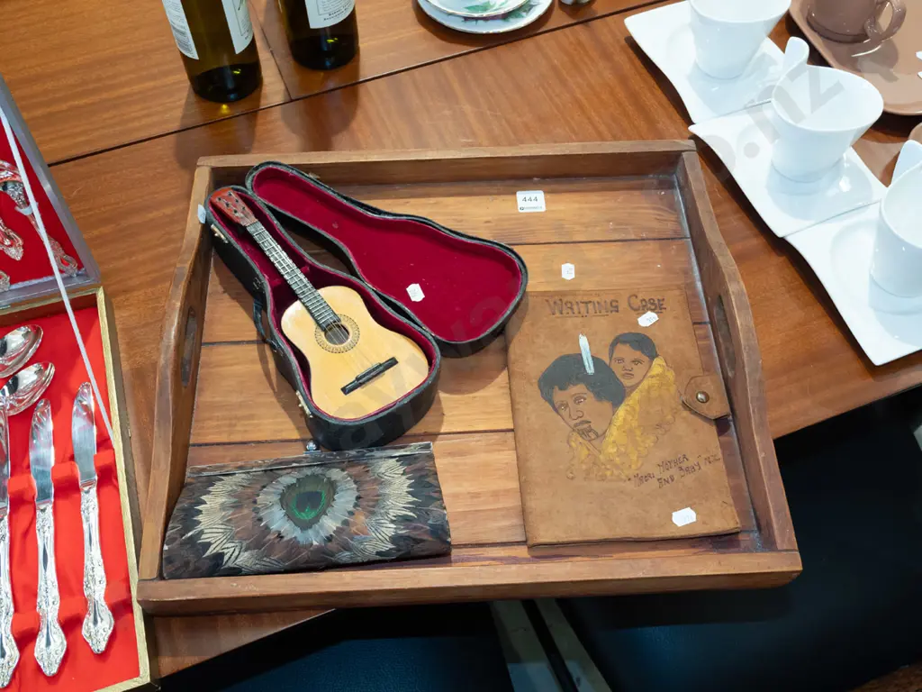 wooden tray; peacock feather decorated purse, tiny guitar, tooled leather Maori themed writing case Image 1++