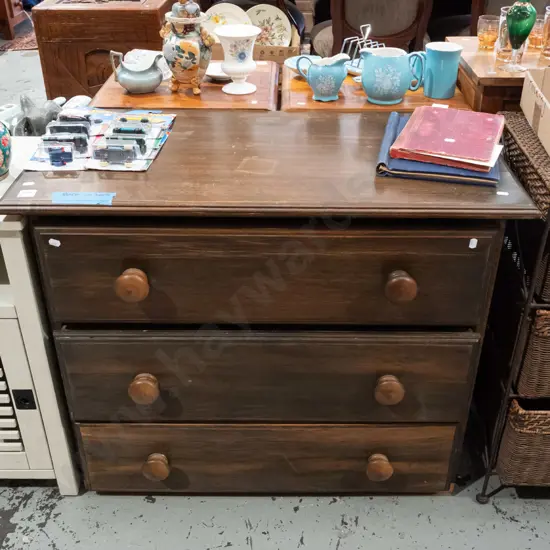 dark stained 3 drawer lowboy - borer in back H690 W840 D430
