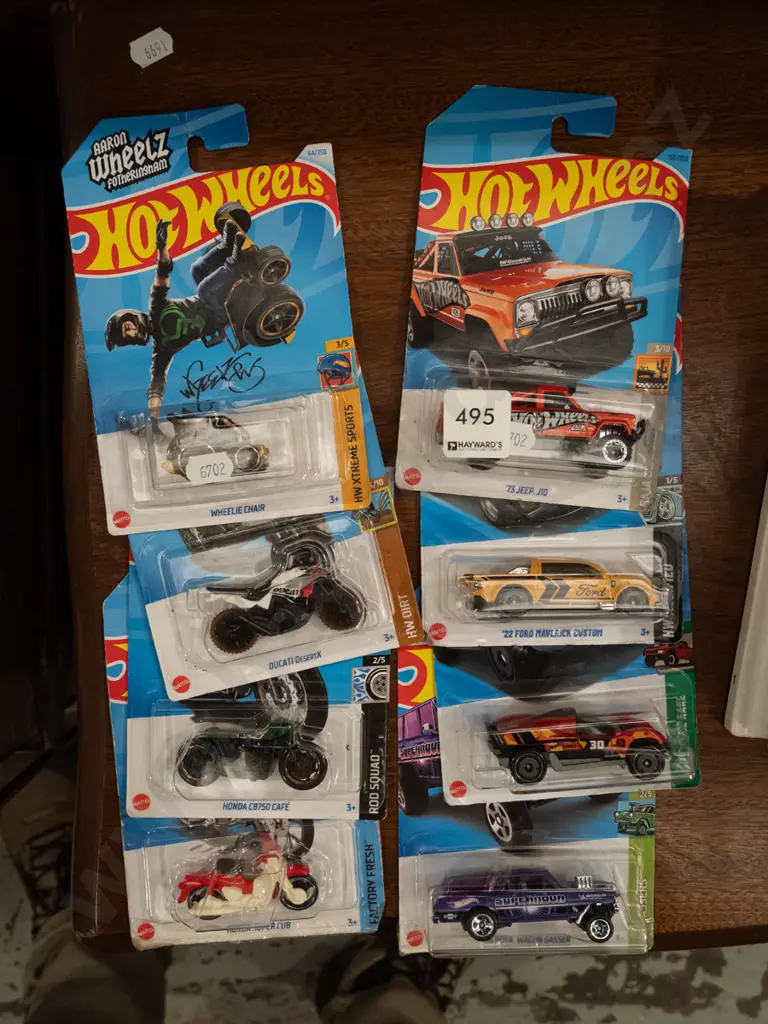 8x as new carded Hotwheels vehicles Image 1++