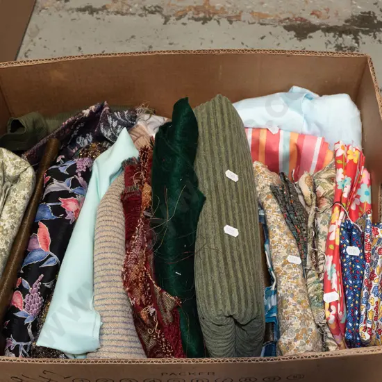 box of fabric pieces