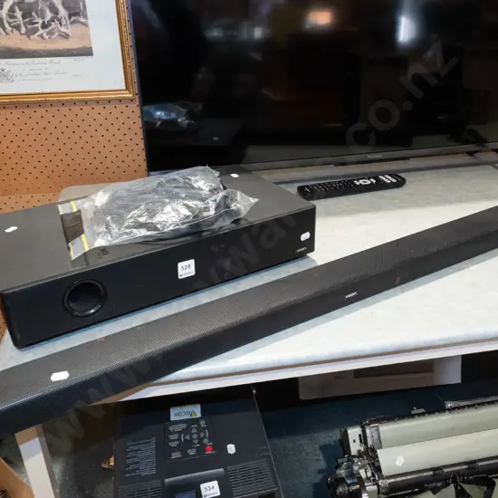 Veon sound bar, subwoofer and bag of accessories