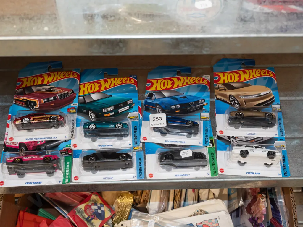 8x as new carded Hotwheels vehicles Image 1++
