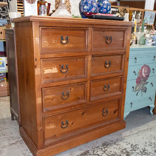solid pine 7 drawer chest - significant wear to varnish, marks on top H1220 W1100 D505