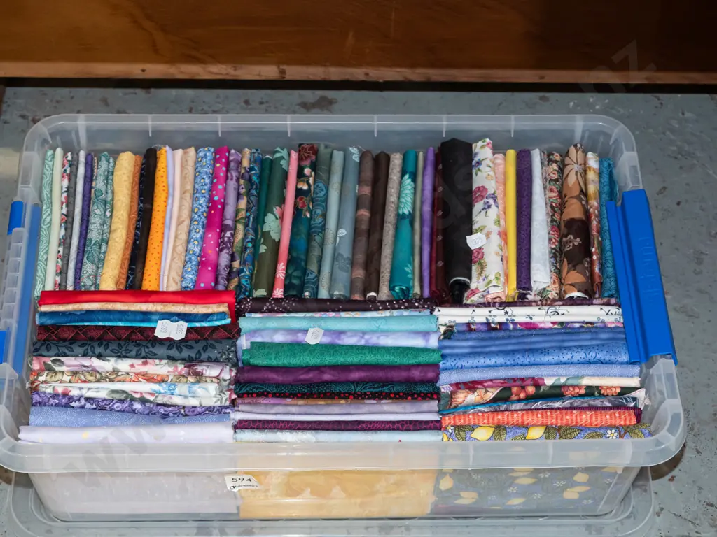 plastic tub of fabric pieces Image 1++