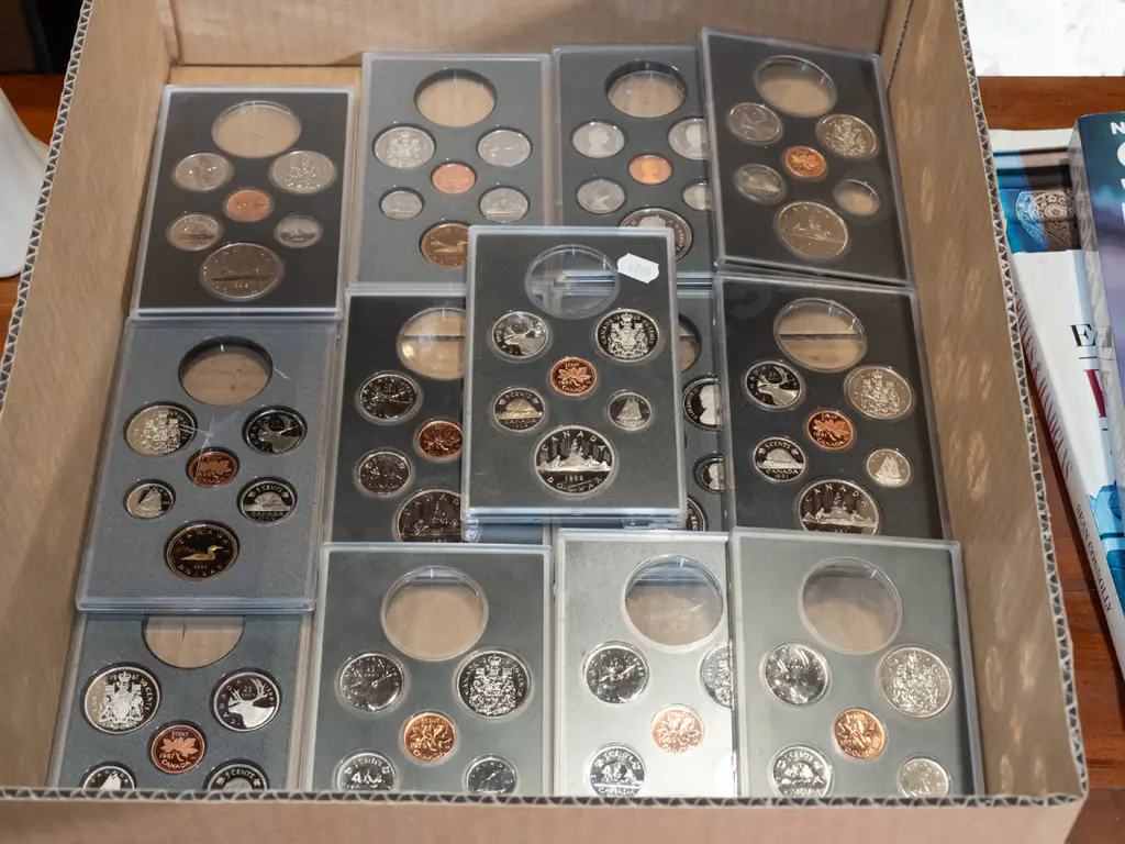 cased Canadian coin sets - missing some coins Image 1++
