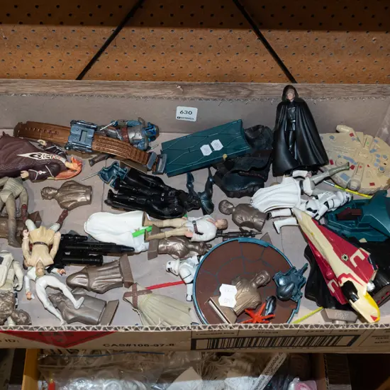 box of various Star Wars figurines