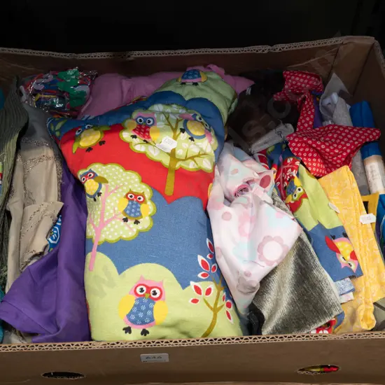 box of fabric pieces