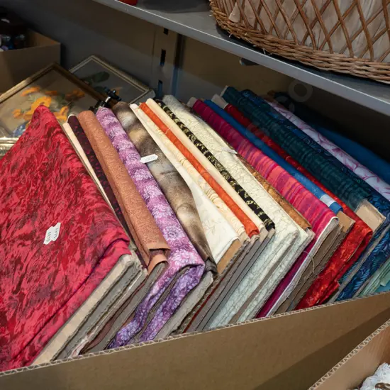 box of fabric pieces