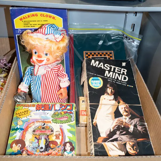 box; robotic clown, plastic pin ball game etc